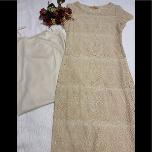 Beautiful dress, creamy beige with separate slip dress that goes underneath.